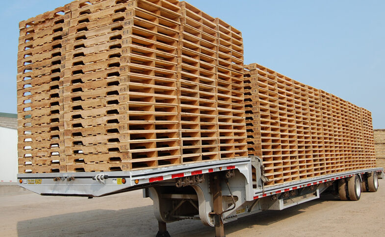 wooden pallets stacked on a semi trailer