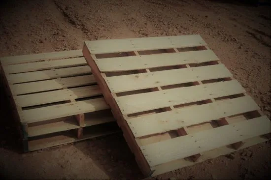 Pallets for sale on top of dirt